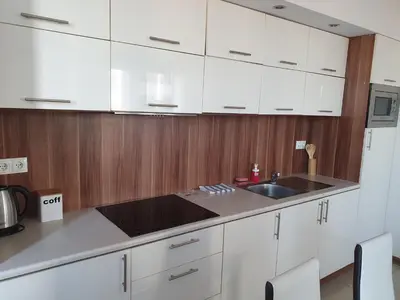 Kuchnia lub aneks kuchenny w obiekcie NotaBene Wola Apartment