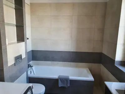 Łazienka w obiekcie NotaBene Wola Apartment