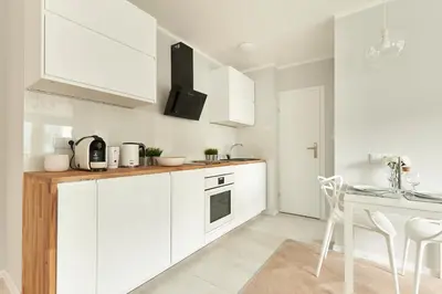 Kuchnia lub aneks kuchenny w obiekcie Hello Warsaw! Brand new modern apartment in the city center