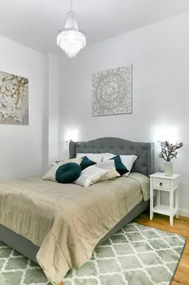 Łóżko lub łóżka w pokoju w obiekcie Stara Praga Vistula Apartment by BookingHost
