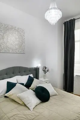 Łóżko lub łóżka w pokoju w obiekcie Stara Praga Vistula Apartment by BookingHost