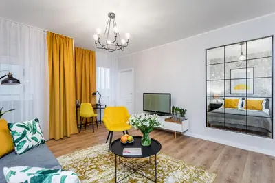 Telewizja i/lub zestaw kina domowego w obiekcie VIDOC APARTMENTS