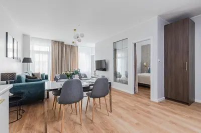 Telewizja i/lub zestaw kina domowego w obiekcie VIDOC APARTMENTS