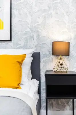 Łóżko lub łóżka w pokoju w obiekcie VIDOC APARTMENTS