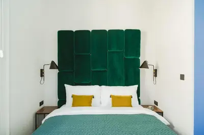 Łóżko lub łóżka w pokoju w obiekcie No.4 Residence