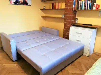 Łóżko lub łóżka w pokoju w obiekcie Rynek Starego Miasta Old Town Market Square - 2 bedrooms apartment
