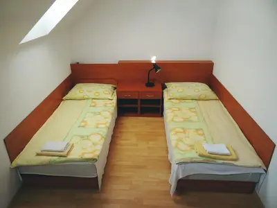 Łóżko lub łóżka w pokoju w obiekcie Willa Ewa