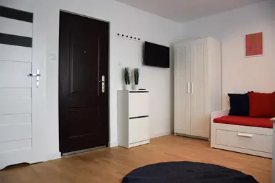 Telewizja i/lub zestaw kina domowego w obiekcie Apartamenty Coco Premium Saska Kępa