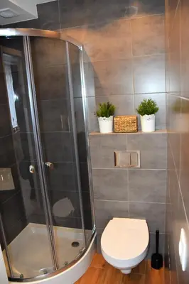 Łazienka w obiekcie Apartamenty Coco Premium Saska Kępa