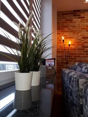 Łóżko lub łóżka w pokoju w obiekcie Apartamenty Planet