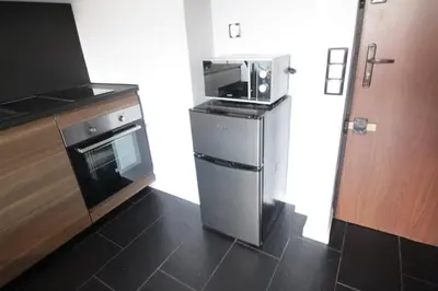 Kuchnia lub aneks kuchenny w obiekcie KRÓLEWSKA Apartament HAPPY HOME