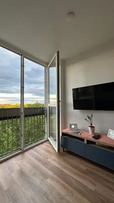 Telewizja i/lub zestaw kina domowego w obiekcie Warsaw View Apartment