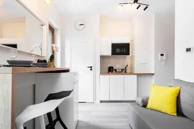 Kuchnia lub aneks kuchenny w obiekcie Apartments Warsaw Pawia by Noclegi Renters