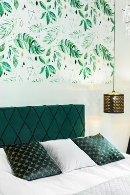 Łóżko lub łóżka w pokoju w obiekcie Apartments Warsaw Pawia by Noclegi Renters