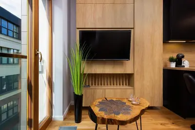 Telewizja i/lub zestaw kina domowego w obiekcie Apartments Warsaw Pawia by Noclegi Renters