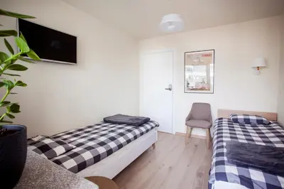 Łóżko lub łóżka w pokoju w obiekcie Chmielna - City Center Residence