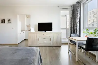Telewizja i/lub zestaw kina domowego w obiekcie Airport Residence ORANGE