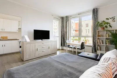 Telewizja i/lub zestaw kina domowego w obiekcie Airport Residence ORANGE