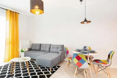 Część wypoczynkowa w obiekcie Apartments Rondo Wiatraczna by Noclegi Renters