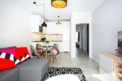 Część wypoczynkowa w obiekcie Apartments Rondo Wiatraczna by Noclegi Renters
