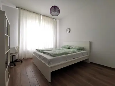 Łóżko lub łóżka w pokoju w obiekcie ShortStayPoland Leszczyńska (B14)