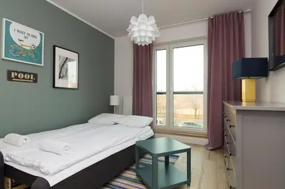 Łóżko lub łóżka w pokoju w obiekcie ShortStayPoland Żupnicza (B32)