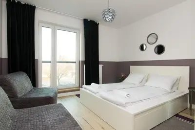 Łóżko lub łóżka w pokoju w obiekcie ShortStayPoland Żupnicza (B32)