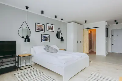 Łóżko lub łóżka w pokoju w obiekcie ShortStayPoland Pereca (B68)