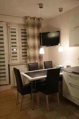 Telewizja i/lub zestaw kina domowego w obiekcie Eden Apartment Łucka
