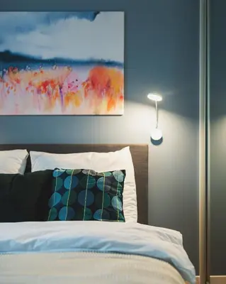 Łóżko lub łóżka w pokoju w obiekcie Airport Okecie Wagonowa Serviced Apartments