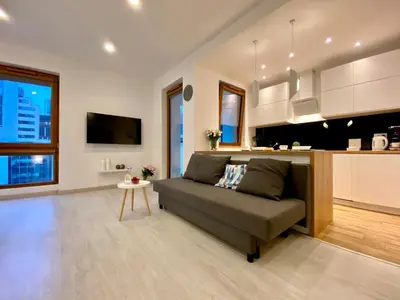 Telewizja i/lub zestaw kina domowego w obiekcie Living Point Residence Center