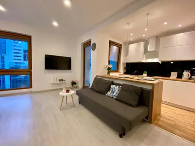 Telewizja i/lub zestaw kina domowego w obiekcie Living Point Residence Center