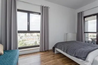 Łóżko lub łóżka w pokoju w obiekcie Chill Apartments Wolska 45