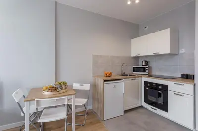 Kuchnia lub aneks kuchenny w obiekcie Chill Apartments Wolska 45