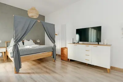 Łóżko lub łóżka w pokoju w obiekcie ShortStayPoland Marymoncka