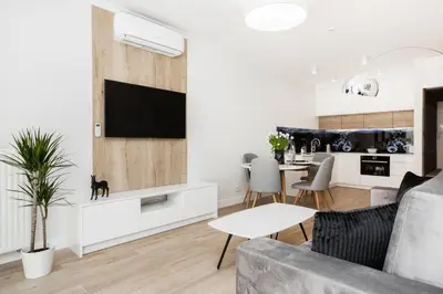 Telewizja i/lub zestaw kina domowego w obiekcie Apartments Warsaw Przyokopowa by Noclegi Renters