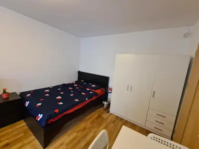 Łóżko lub łóżka w pokoju w obiekcie MirrorRoom PL CityCenter