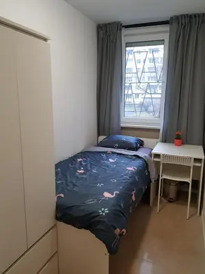Łóżko lub łóżka w pokoju w obiekcie MirrorRoom PL CityCenter