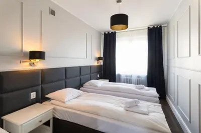 Łóżko lub łóżka w pokoju w obiekcie Executive 3 Bedroom Apartament by Your Freedom
