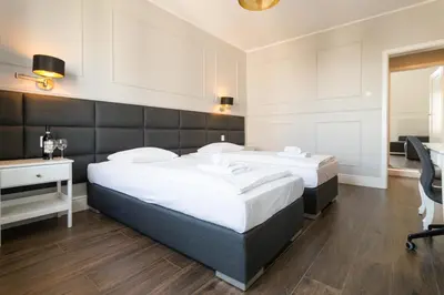 Łóżko lub łóżka w pokoju w obiekcie Executive 3 Bedroom Apartament by Your Freedom