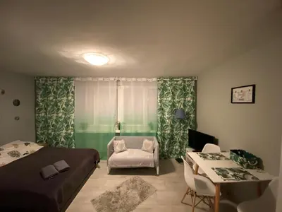 Łóżko lub łóżka w pokoju w obiekcie Apartament Centrum Pańska