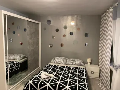 Łóżko lub łóżka w pokoju w obiekcie Apartament Centrum Pańska