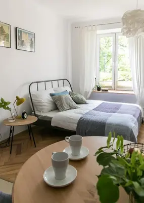Łóżko lub łóżka w pokoju w obiekcie Bednarska Apartment