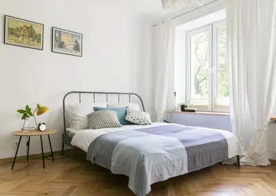 Łóżko lub łóżka w pokoju w obiekcie Bednarska Apartment