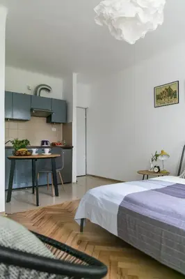 Łóżko lub łóżka w pokoju w obiekcie Bednarska Apartment