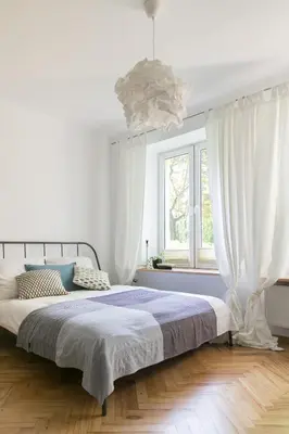 Łóżko lub łóżka w pokoju w obiekcie Bednarska Apartment