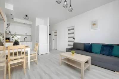 Kuchnia lub aneks kuchenny w obiekcie M&R Apartament Airport&Business Cybernetyki - underground garage - self check-in - fast Wi-Fi - 5 min from Chopin Airport