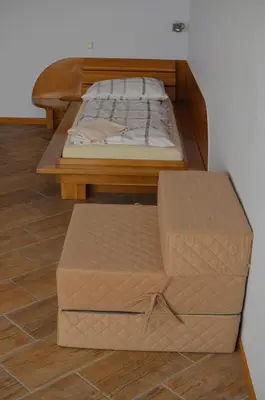 Łóżko lub łóżka w pokoju w obiekcie Studio 4