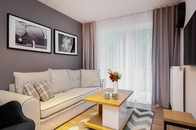 Część wypoczynkowa w obiekcie Apartments Parks of Warsaw by Noclegi Renters