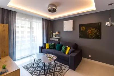 Część wypoczynkowa w obiekcie M&R Apartament Airport&Business DeLuxe Cybernetyki 17 - underground garage - free WiFi - Netflix - air conditioning - self check-in, close by Chopin Airport